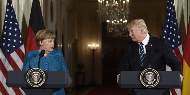 US President Donald Trump and German Chancellor Angela Merkel hold a joint press conference in the East Room of the White House in Washington, DC, on March 17, 2017. / AFP PHOTO / SAUL LOEB (Photo credit should read SAUL LOEB/AFP/Getty Images)