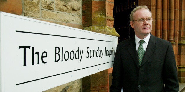 Sinn Fein chief negotiator Martin McGuinness stands outside theGuildhall during his attendance giving evidence at the Saville Inquiryinto