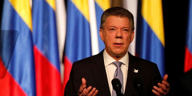 Colombia's President Juan Manuel Santos gives his speech after signing a new peace accord with Marxist FARC rebel leader Rodrigo Londono, known as Timochenko, in Bogota, Colombia November 24, 2016. Picture Taken November 24, 2016. REUTERS/Jaime Saldarriaga
