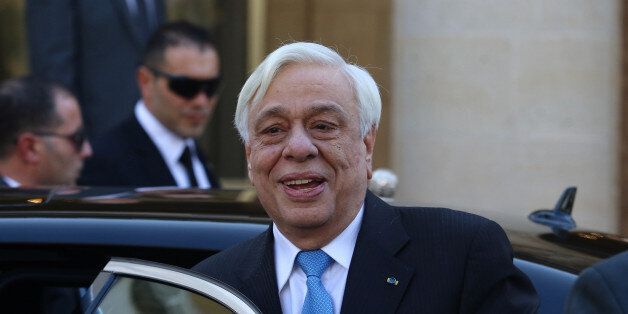 Greek President Prokopis Pavlopoulos arrives at the Presidential Palace in Nicosia, Cyprus January 19, 2017. REUTERS/Yiannis Kourtoglou
