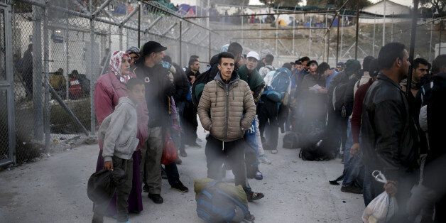 Refugees and migrants wait to be registered at the Moria refugee camp on the Greek island of Lesbos, November 5, 2015. REUTERS/Alkis Konstantinidis/File Photo
