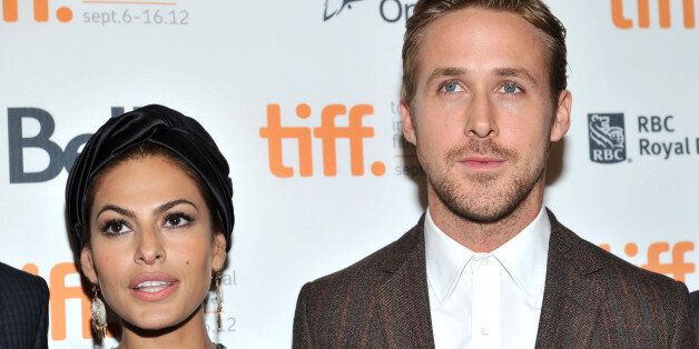 TORONTO, ON - SEPTEMBER 07: Actors (L-R) Eva Mendes and Ryan Gosling attend 'The Place Beyond The Pines' premiere during the 2012 Toronto International Film Festival at Princess of Wales Theatre on September 7, 2012 in Toronto, Canada. (Photo by Sonia Recchia/Getty Images)