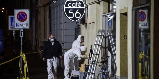 Police collect evidence at the site of a shooting on early March 10, 2017 in the city of Basel, north-west Switzerland.Two men shot dead two people and seriously injured a third at a cafe in Basel, north-west Switzerland, police said as they hunt for the suspects. / AFP PHOTO / Sebastien Bozon (Photo credit should read SEBASTIEN BOZON/AFP/Getty Images)