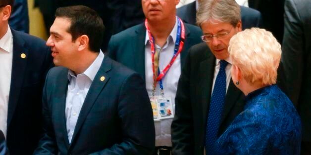 Greek Prime Minister Alexis Tsipras (L) and Italian Prime Minister Paolo Gentiloni (R) take part in the EU summit at the new 'Europa' building in Brussels on March 9, 2017. / AFP PHOTO / POOL / OLIVIER HOSLET (Photo credit should read OLIVIER HOSLET/AFP/Getty Images)