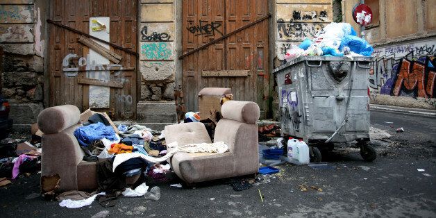 Armchairs, clothes and a broken sofa next to garbage, Athens, Greece, Oct 11, 2016 (Photo by Giorgos Georgiou/NurPhoto via Getty Images)