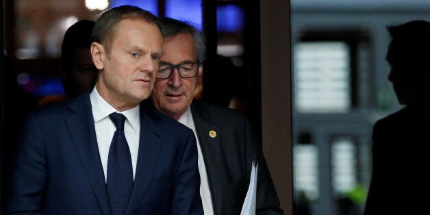 European Council President Donald Tusk (L) and European Commission President Jean-Claude Juncker arrive to address a news conference during a European Union leaders summit in Brussels, Belgium March 10, 2017. REUTERS/Francois Lenoir