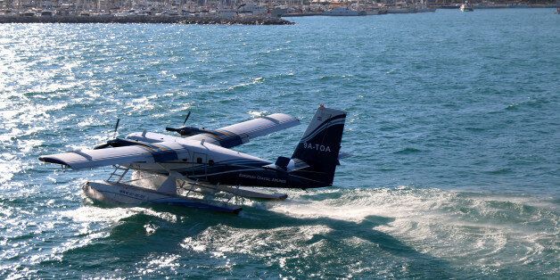 Split, Croatia - July 29, 2016: Hydroplane taking off in Split, Croatia. Split is popular coastal touristic destination during summer.