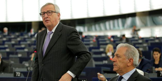 European Commission President Jean-Claude Juncker (L) addresses the European Parliament in Strasbourg, France, July 5, 2016. Rights is European Commissioner for Migration and Home Affairs Dimitris Avramopoulos. REUTERS/Vincent Kessler