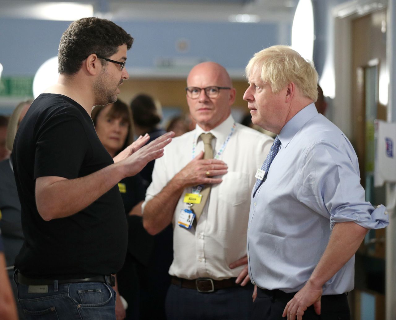 The father of a sick baby confronts Boris Johnson during a hospital visit in east London 
