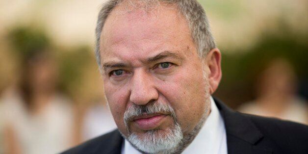 New Israeli Defence Minister Avigdor Lieberman attends a government cabinet meeting in Ein Lavan spring located on the outskirts of Jerusalem on June 2, 2016 to mark Jerusalem Day which will be celebrated on June 5. / AFP / POOL / ABIR SULTAN (Photo credit should read ABIR SULTAN/AFP/Getty Images)