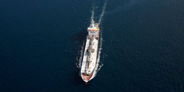 A tanker operated by SCF Group sails from port in the Aegean sea off the coast of Athens, Greece, on Thursday, June 25, 2015. Greece could tap euro-area funds of as much as 3.35 billion euros ($3.75 billion) by early July if it can reach a deal with its creditors, thanks to profit-sharing pledges from member nations' central banks. Photographer: Simon Dawson/Bloomberg via Getty Images