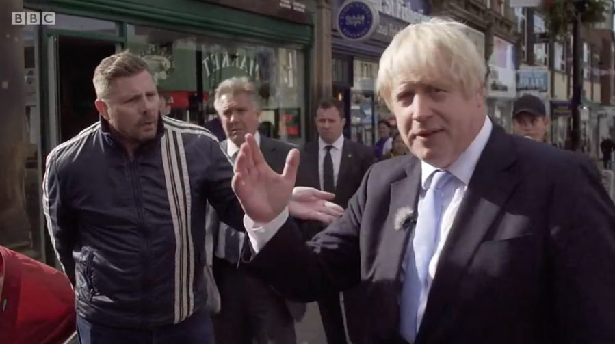 Boris Johnson being heckled during a walkabout in Morley, Leeds 