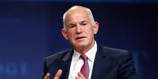 George Papandreou, former Greek prime minister, speaks at a panel discussion at the SALT conference in Las Vegas May 14, 2014. SALT is produced by SkyBridge Capital, a global investment firm. REUTERS/Rick Wilking (UNITED STATES - Tags: BUSINESS POLITICS)