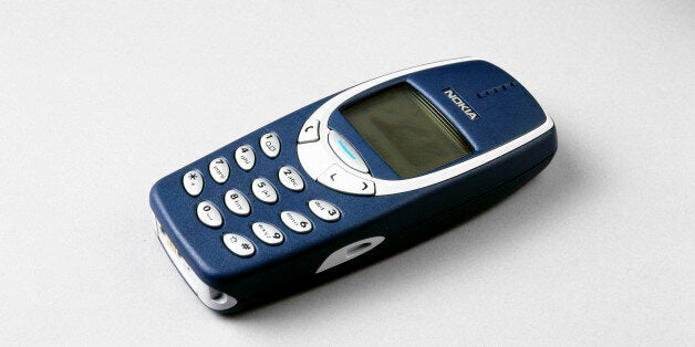 JAPAN - FEBRUARY 15: Launched on the 1st September 2000, the Nokia 3310 featured advanced messaging, personalisation with Xpress-on covers and screensavers, vibra feature, time management functions, voice dialling, picture messaging, predictive text input and games. It also introduced �mobile chat� using the Nokia Friends-Talk service, which allows users to have conversations using SMS (Short Message Service). This is a globally accepted wireless service that enables the transmission