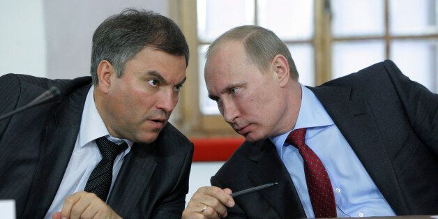 Russia's Prime Minister Vladimir Putin (R) talks to Government Chief of Staff Vyacheslav Volodin during a meeting on the development of local self-government in Pskov's Kremlin, some 650 km (404 miles) northwest of Moscow May 23, 2011. REUTERS/Alexei Nikolsky/RIA Novosti/Pool (RUSSIA - Tags: POLITICS) THIS IMAGE HAS BEEN SUPPLIED BY A THIRD PARTY. IT IS DISTRIBUTED, EXACTLY AS RECEIVED BY REUTERS, AS A SERVICE TO CLIENTS