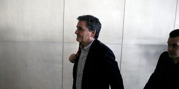 Greek Finance Minister Euclid Tsakalotos arrives at a hotel for a meeting with representatives of the country's international lenders in Athens, Greece, February 28, 2017. REUTERS/Alkis Konstantinidis