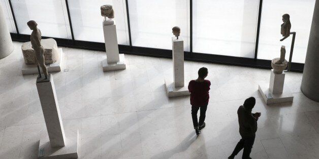 ATHENS, GREECE - DECEMBER 01: People visit the Acropolis Museum in Athens, Greece on December 01, 2016. Acropolis Museum, opened in 2009, has an average of 4,000 visitors per day. Four thousand historical findings are exhibited at the Acropolis Museum with the exhibition area of 14 thousand square meters. (Photo by Ayhan Mehmet/Anadolu Agency/Getty Images)