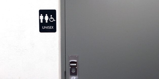 CAMBRIDGE, MA - MAY 24: Some places have decided that the label unisex offers the simplest solution to the question of what restroom signs should say as transgender activists fight to use the facility that matches their identity. (Photo by Barry Chin/The Boston Globe via Getty Images)
