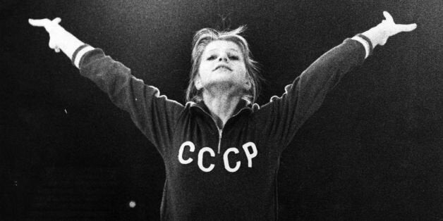 Russian gymnast Olga Korbut in action on the bars at Wembley, in training for the World Cup for Gymnastics. (Photo by Central Press/Getty Images)