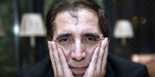Iran's film director Mohsen Makhmalbaf poses on March 10, 2015 in Paris, a week before the release in France of his last movie 'Le President'. AFP PHOTO / LOIC VENANCE (Photo credit should read LOIC VENANCE/AFP/Getty Images)