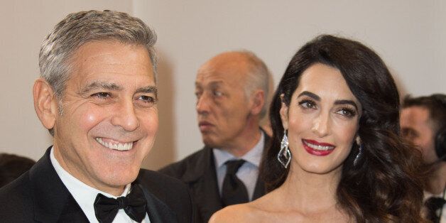 PARIS, FRANCE - FEBRUARY 24: George Clooney and Amal Clooney attend the Cesar Film Awards 2017 ceremony at Salle Pleyel on February 24, 2017 in Paris, France. (Photo by Stephane Cardinale - Corbis/Corbis via Getty Images )