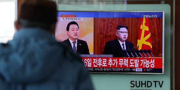 A man watches a television screen showing showing an image of Kim Jong Un, leader of North Korea during a news broadcast on North Korea's unidentified ballistic missile launch at Seoul Station in Seoul, South Korea, on Sunday, Feb. 12, 2017. North Korea fired an unidentified ballistic missile into nearby seas on Sunday, its first provocation since U.S. President Donald Trump took office. Photographer: SeongJoon Cho/Bloomberg via Getty Images