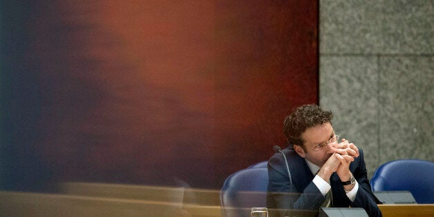 Jeroen Dijsselbloem, Dutch Finance Minister and head of the Eurogroup of euro zone finance ministers, reacts during questions about Cyprus and its bailout in the Dutch Parliament in The Hague March 26, 2013. REUTERS/ Bart Maat(NETHERLANDS - Tags: POLITICS BUSINESS)