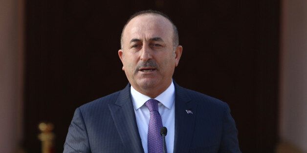 Turkey's Foreign Minister Mevlut Cavusoglu speaks to the media during a visit in Nicosia, northern Cyprus, February 21, 2017. REUTERS/Yiannis Kourtoglou
