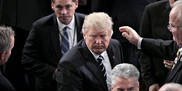 U.S. President Donald Trump exits after speaking during a joint session of Congress in Washington, D.C., U.S., on Tuesday, Feb. 28, 2017. Trump will press Congress to carry out his priorities for replacing Obamacare, jump-starting the economy and bolstering the nations defenses in an address eagerly awaited by lawmakers, investors and the public who want greater clarity on his policy agenda. Photographer: Andrew Harrer/Bloomberg via Getty Images