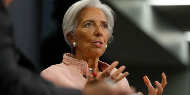 International Monetary Fund (IMF) Managing Director Christine Lagarde (R) participates in an onstage interview with Reuters Editor-at-Large Axel Threlfall (L) at the Atlantic Council in Washington, U.S., February 8, 2017. REUTERS/Jonathan Ernst