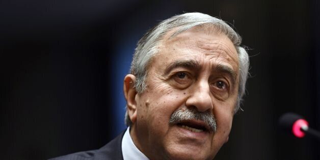 Turkish Cypriot leader Mustafa Akinci arrives for a press conference on UN-sponsored Cyprus peace talks on January 13, 2017 in Geneva.Hopes for a peace deal in Cyprus stalled on January 13, 2017 over a decades-old dispute, with the rival sides at loggerheads over the future of Turkish troops on the divided island. A week of UN-brokered talks in Geneva between Greek Cypriot President and Turkish Cypriot leader sparked optimism that an agreement to reunify the island could be at hand. But any sett