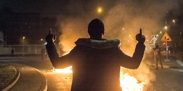 People from varied societies stage a protest against police violence on February 11, 2017 in Bobigny District of Paris France. Protests erupted following an alleged police violence and sexual harrasment against a 22-year-old black young man, identified as Theo, allegedly sodomized by police then hospitalized on February 02. (Photo by Julien Mattia/NurPhoto via Getty Images)