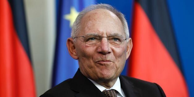 German Finance Minister Wolfgang Schaeuble smiles during a meeting beetween the German Chancellor and the new President of Germany's Upper House of Parliament and Rhineland-Palatinate State Premier Malu Dreyer (not pictured) on February 10, 2017 at the Chancellery in Berlin. / AFP / Odd ANDERSEN (Photo credit should read ODD ANDERSEN/AFP/Getty Images)