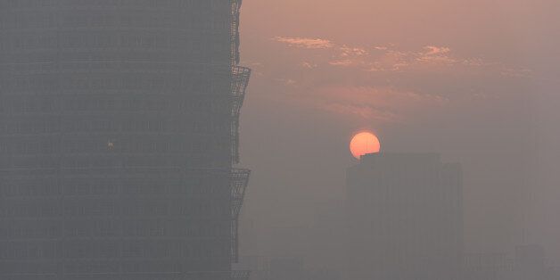 A view of sunset is seen in smog in Zhengzhou, Henan province, China January 2, 2017. Picture taken January 2, 2017. REUTERS/Stringer ATTENTION EDITORS - THIS IMAGE WAS PROVIDED BY A THIRD PARTY. EDITORIAL USE ONLY. CHINA OUT. NO COMMERCIAL OR EDITORIAL SALES IN CHINA.