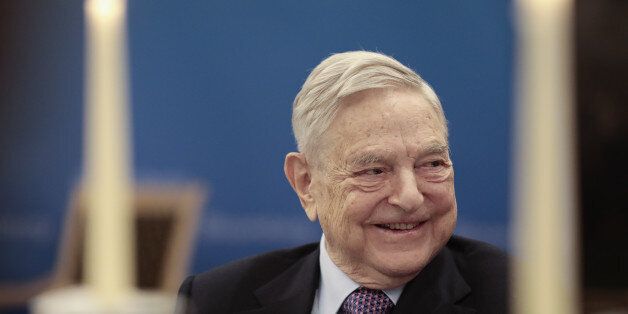 George Soros, billionaire and founder of Soros Fund Management LLC, smiles during a Bloomberg Television interview at the World Economic Forum (WEF) in Davos, Switzerland, on Thursday, Jan. 19, 2017. World leaders, influential executives, bankers and policy makers attend the 47th annual meeting of the World Economic Forum in Davos from Jan. 17 - 20. Photographer: Jason Alden/Bloomberg via Getty Images