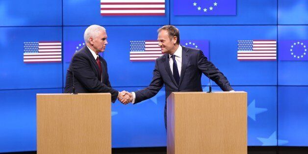 BRUSSELS, BELGIUM - FEBRUARY 20 : United States Vice President Mike Pence (L) and EU Council President Donald Tusk (R) shake their hands during a joint press conference following their meeting in Brussels, Belgium on February 20, 2017. (Photo by Dursun Aydemir/Anadolu Agency/Getty Images)