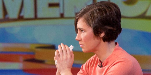 Amanda Knox reacts during her interview on ABC's