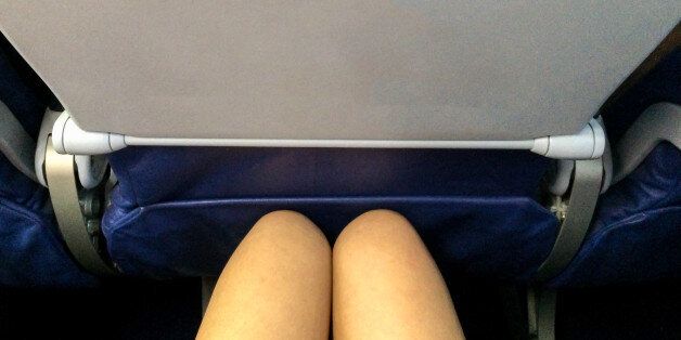 Ergonomic while Travel Concept, Women Leg with The Small Space of Plane Seat on Low Cost Aircraft