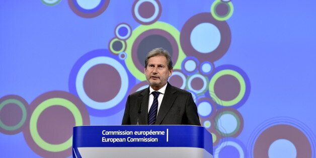 European Neighbourhood Policy and Enlargement Negotiations Commissioner Johannes Hahn gestures during a news conference at the European Commission headquarters in Brussels, Belgium, November 10, 2015. The European Commission presented its 2015 Enlargement Package, covering the Western Balkans and Turkey. REUTERS/Eric Vidal