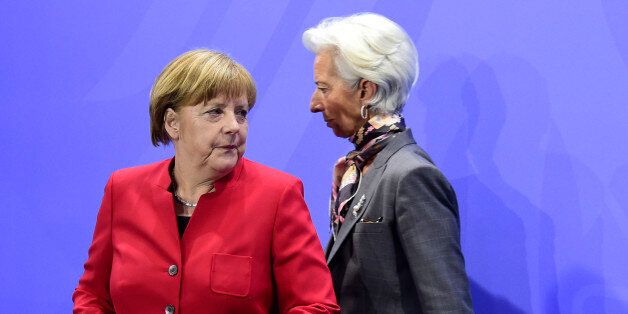 Christine Lagarde, Managing Director of the International Monetary Fund (IMF) and German Chancellor Angela...