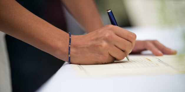 signatures during a wedding ceremony