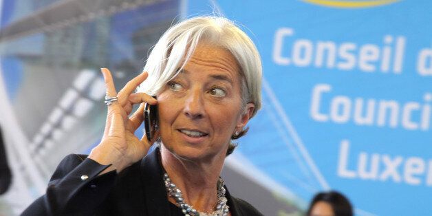 Christine Lagarde, France's finance minister, speaks on her mobile phone as she arrives for the European Union finance ministers meeting in Luxembourg, on Monday, June 7, 2010. The euro's 21 percent tumble from last year's high has left the currency above the average level since its creation in 1999 and stronger than its predecessor, the deutsche mark. Photographer: Hannelore Foerster/Bloomberg via Getty Images