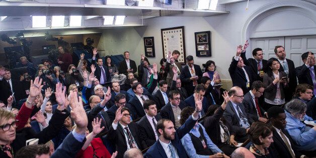 WASHINGTON, DC - FEBRUARY 1: Reporters raise their hands to ask questions of White House press secretary Sean Spicer in the James S. Brady Press Briefing Room during the daily news briefing at the White House in Washington, DC on Wednesday, Feb. 01, 2017. (Photo by Jabin Botsford/The Washington Post via Getty Images)