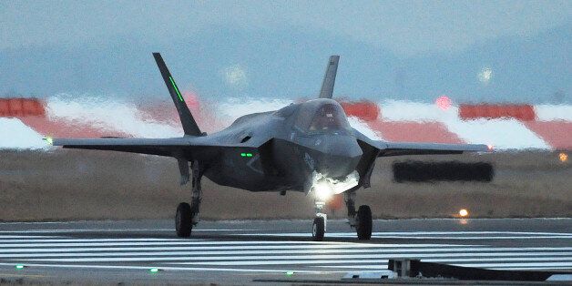This picture taken on January 18, 2017 shows a US F-35B stealth fighter jet taxiing after landing at the US Marine's Iwakuni Air Station in Iwakuni, Yamaguchi prefecture.The US Marine Corps said on January 11 it was sending a squadron of F-35B fighter jets to Japan, marking the first operational overseas deployment for the controversial aircraft that is under scrutiny from President-elect Donald Trump. / AFP / JIJI PRESS / JIJI PRESS / Japan OUT (Photo credit should read JIJI PRESS/AFP/Getty Images)
