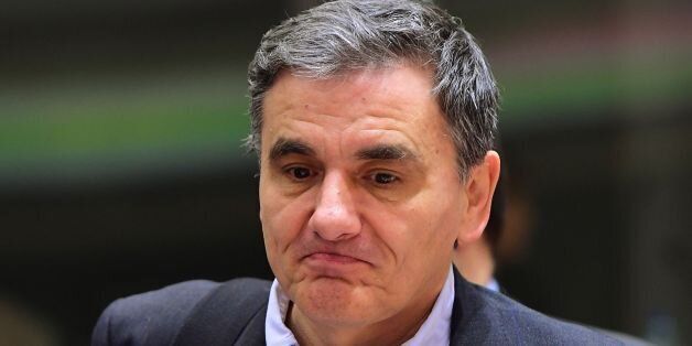 Greece's Finance Minister Euclid Tsakalotos takes part in an Economic and Financial (ECOFIN) Affairs Council meeting at the European Council, in Brussels, on January 27, 2017. / AFP / EMMANUEL DUNAND (Photo credit should read EMMANUEL DUNAND/AFP/Getty Images)