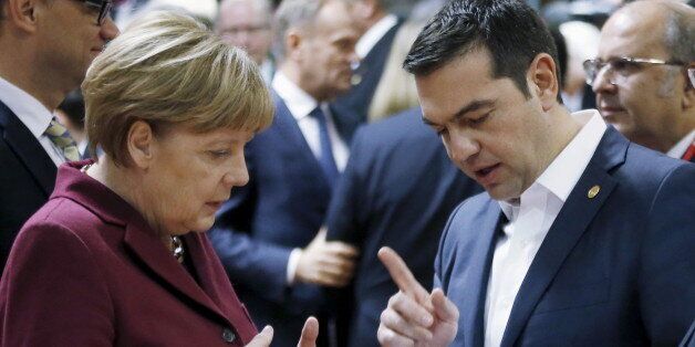 Germany's Chancellor Angela Merkel listens to Greece's Prime Minister Alexis Tsipras (R) during a European Union leaders summit in Brussels, Belgium, October 15, 2015. REUTERS/Francois Lenoir