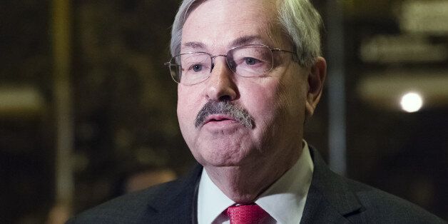 Terry Branstad, governor of Iowa, speaks to members of the media in the lobby at Trump Tower in New York, U.S., on Tuesday, Dec. 6, 2016. As Donald Trump prepares to assume the U.S. presidency, luxury towers from Istanbul to Manila that bear his name become de facto government symbols, making them potential terrorist targets. Experts say the question of how to protect them and who should pay poses a complex ethical and legal dilemma. Photographer: Albin Lohr-Jones/Pool via Bloomberg