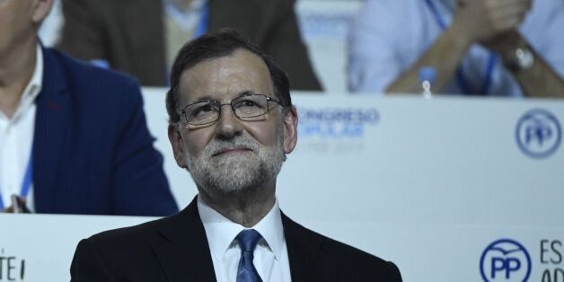 Spanish Prime Minister, Mariano Rajoy sits during the XVIII Popular Party three day congress in Madrid on February 11, 2017 that will renew Spanish Prime Minister Mariano Rajoy as party leader.Rajoy's re-election, in a single candidate ballot, coincides with the announcement of high prison terms for corruption for entrepreneurs and former politicians linked to the ruling formation by the case 'Gurtel'. / AFP / CURTO DE LA TORRE (Photo credit should read CURTO DE LA TORRE/AFP/Getty Images)