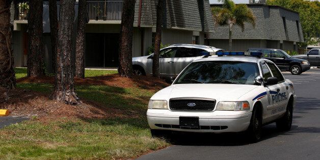 A police car is pictured in front of Omar Mateen's home in Port Saint Lucie, Florida, U.S. June 14, 2016. Mateen attacked gay night club Pulse in Orlando before being shot dead by police. REUTERS/Carlo Allegri