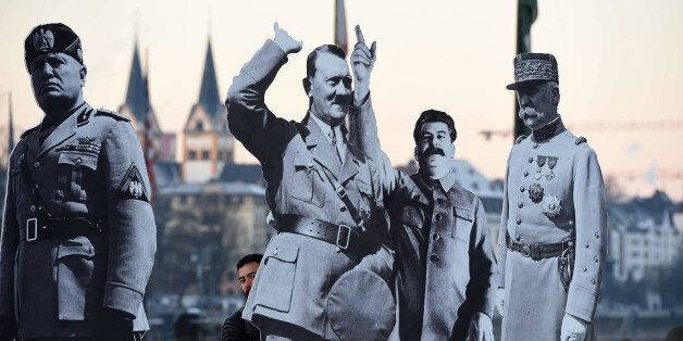 Activists of Avaaz civic organization have set up installed three-meter-high images of former far-right leaders (L-R) Mussolini, Hitler, Stalin and PÃ©tain in front of the towns historic Deutches Eck statue in Koblenz, western Germany, on January 21, 2017, to protest against the congress of European Parliament's Europe of Nations and Freedom (ENF) held in the town.French presidential hopeful Marine Le Pen will headline a European gathering of eurosceptic and far-right leaders in Germany as the